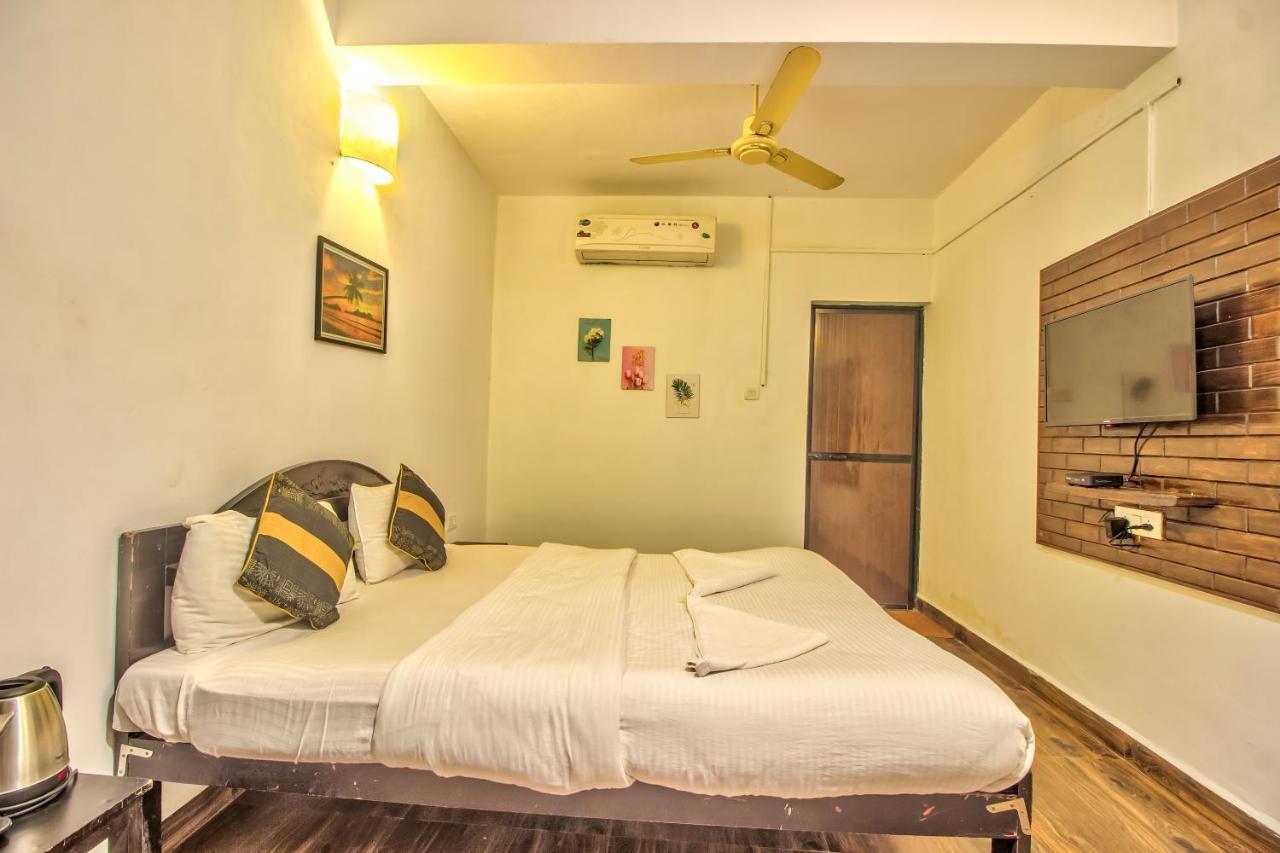 Stanleys Guest House Baga Exterior photo